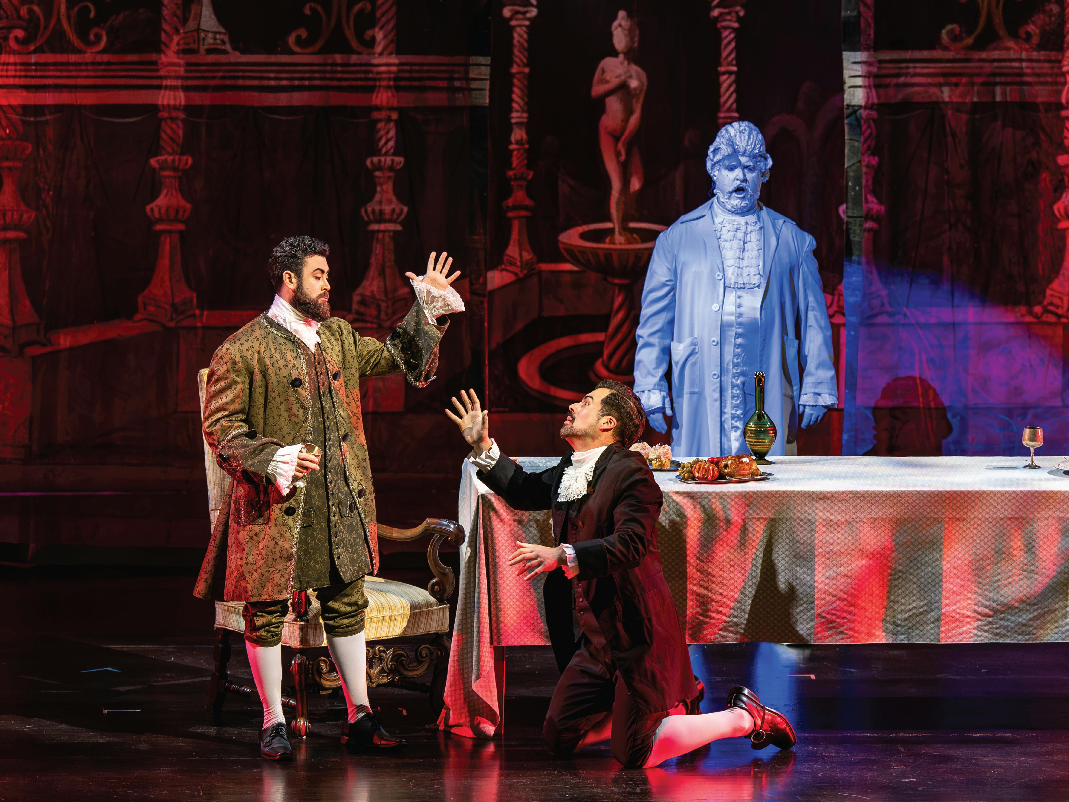 Here is the scene where Don Giovanni is about to meet his doomed fate, with Eleomar Cuello as Don Giovanni, Luis Alejandro Orozco as Leporello, and Andrew Allan Hiers as Il Commendatore in Vero Beach Opera’s 2024 production of Don Giovanni (photo by JPR Images)